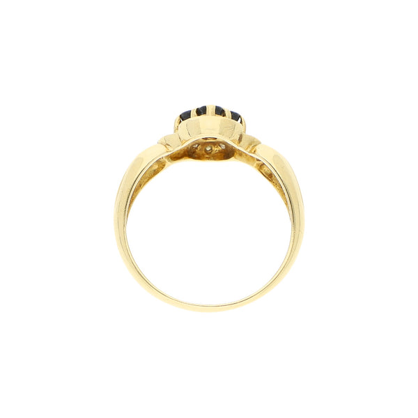 Anillo diseño especial con diamantes y zafiros en oro amarillo 18 kilates.