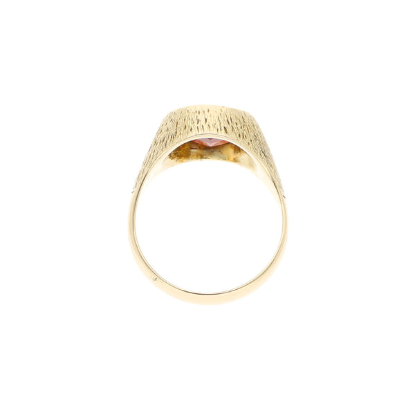 Anillo tipo sello con sintético en oro amarillo 12 kilates.