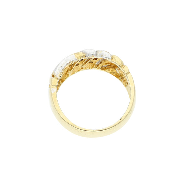 Anillo calado con diamantes en oro amarillo 14 kilates.