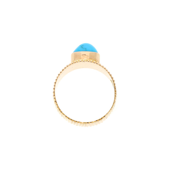 Anillo estriado con turquesa en oro rosa 18 kilates.