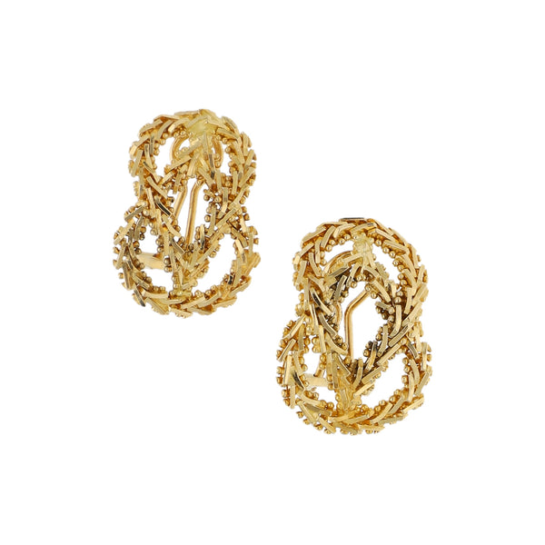 Aretes boleados en oro amarillo 18 kilates.