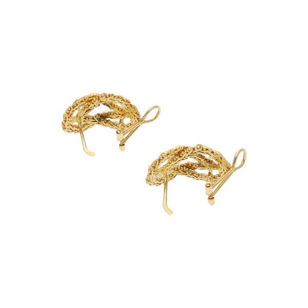 Aretes boleados en oro amarillo 18 kilates.