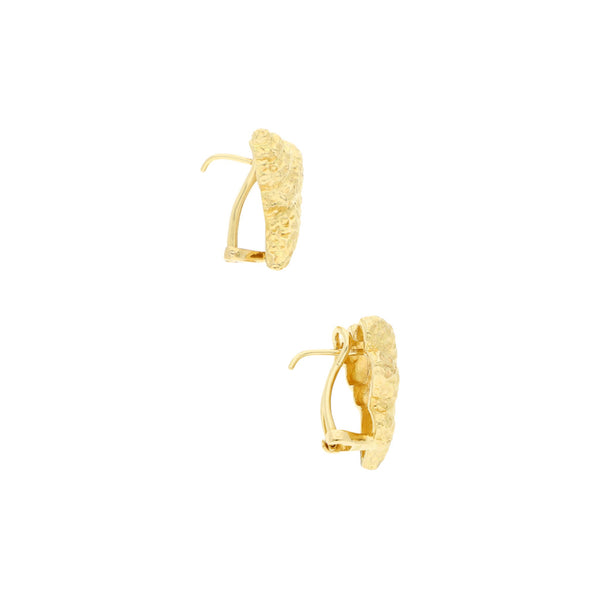 Aretes barrocos en oro amarillo 18 kilates.