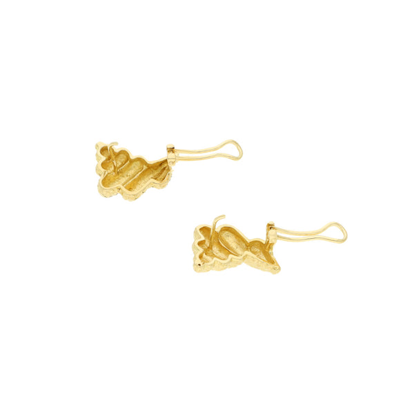 Aretes barrocos en oro amarillo 18 kilates.