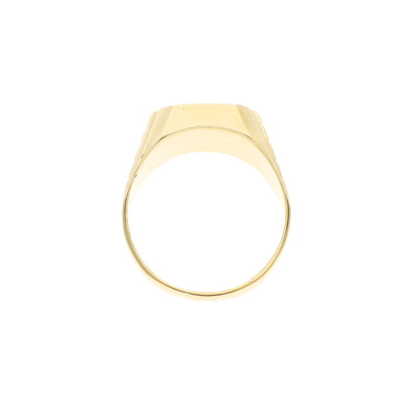 Anillo tipo sello con ónix en oro amarillo 14 kilates.