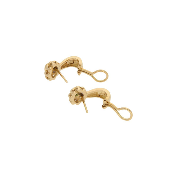 Aretes diseño especial con diamantes y esmeraldas en oro amarillo 14 kilates.