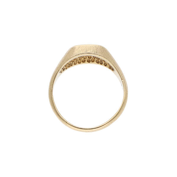 Anillo tipo sello con diamante y esmalte en oro amarillo 14 kilates.