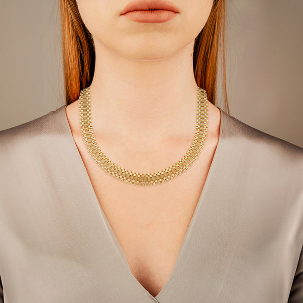 Collar eslabón articulado en oro amarillo 14 kilates.