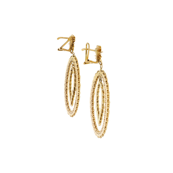 Aretes boleados en oro amarillo 18 kilates.