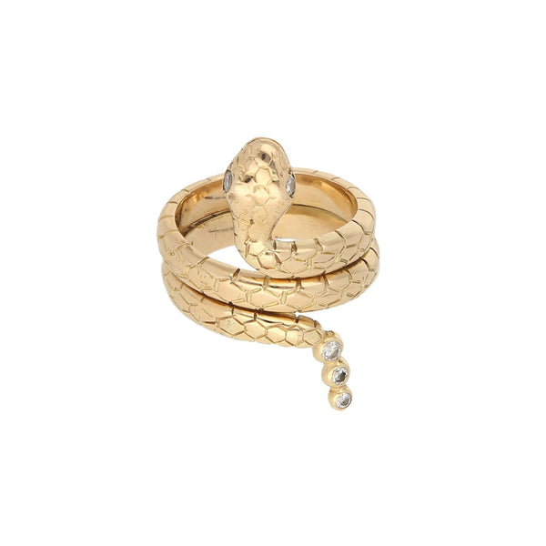 Anillo labrado motivo serpiente con diamantes en oro amarillo 14 kilates.