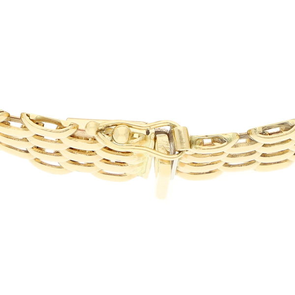 Pulsera eslabón articulado en oro amarillo 14 kilates.