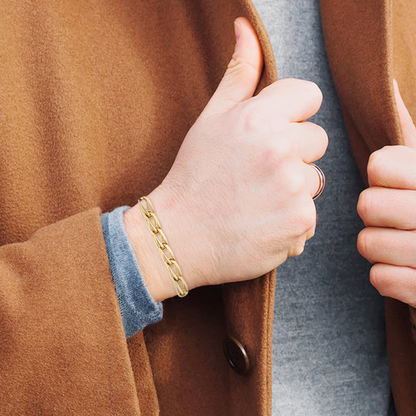 Pulsera eslabón tejido en oro amarillo 14 kilates.