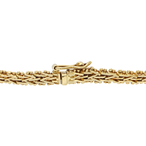 Pulsera eslabón boleado en oro amarillo 18 kilates.