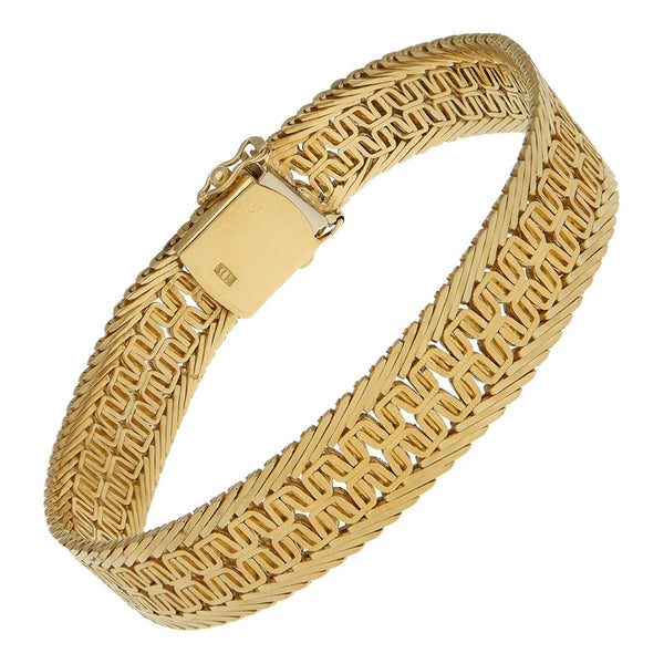 Pulsera eslabón tejido en oro amarillo18 kilates.