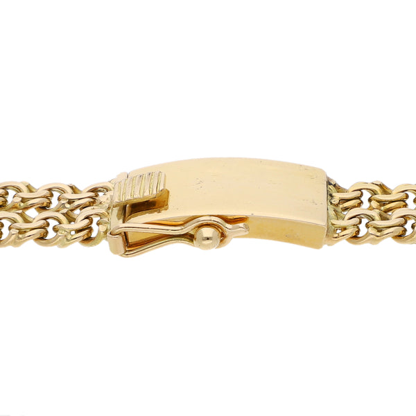 Pulsera de dos hilos eslabón encontrado doble en oro amarillo 18 kilates.