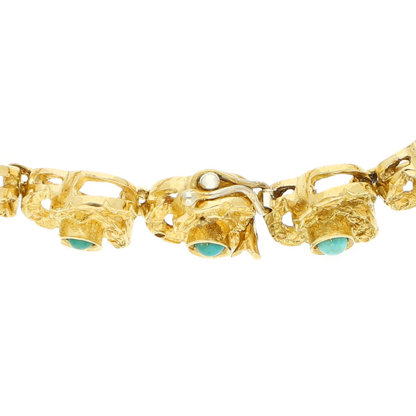 Pulsera eslabón articualdo con sintéticos en oro amarillo 18 kilates.