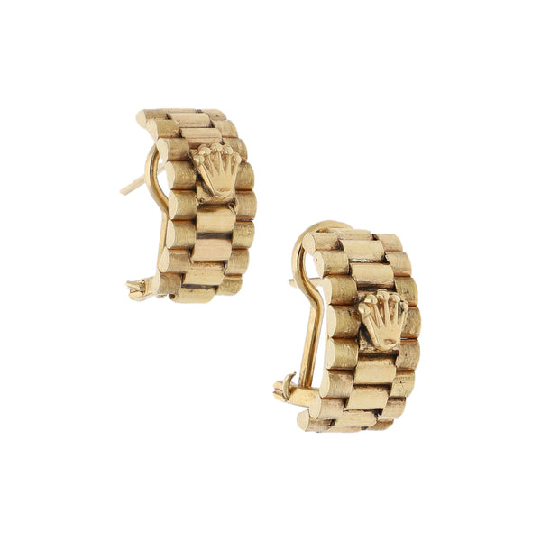 Aretes diseño especial en oro amarillo 14 kilates.