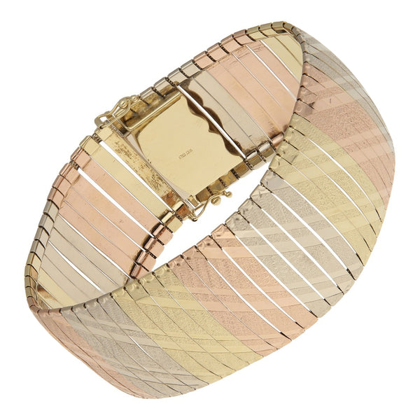 Pulsera eslabón laminado en oro tres tonos 14 kilates.