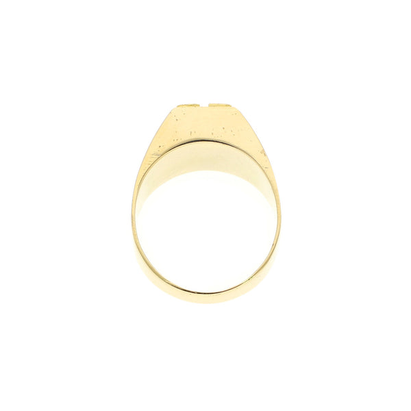 Anillo tipo sello con diamantes en oro amarillo 18 kilates.