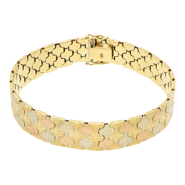 Pulsera eslabón articulado en oro tres tonos 18 kilates.