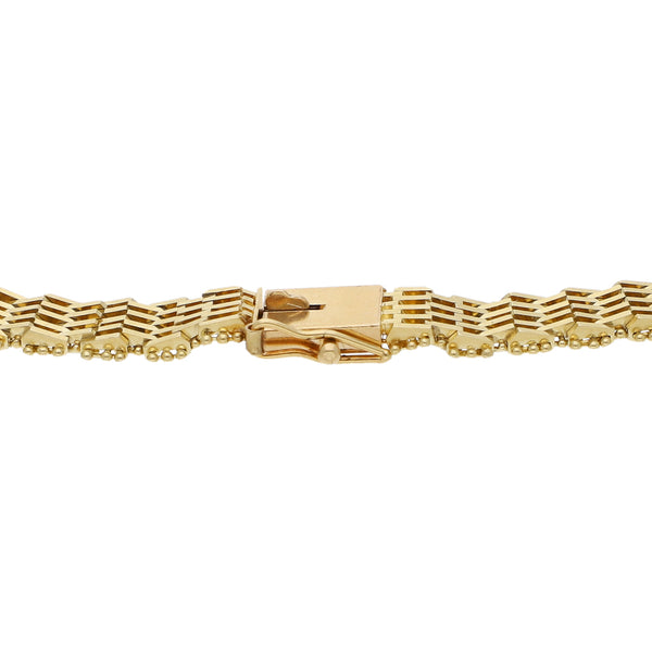 Pulsera eslabón boleado en oro amarillo 14 kilates.