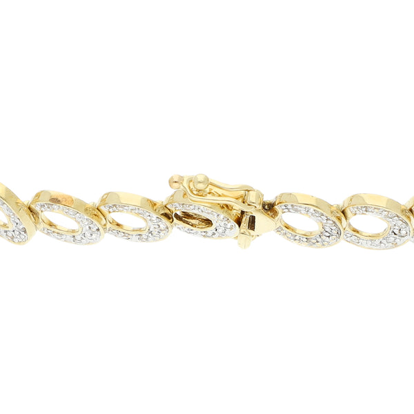 Pulsera eslabón articulado con diamantes en oro amarillo 14 kilates.