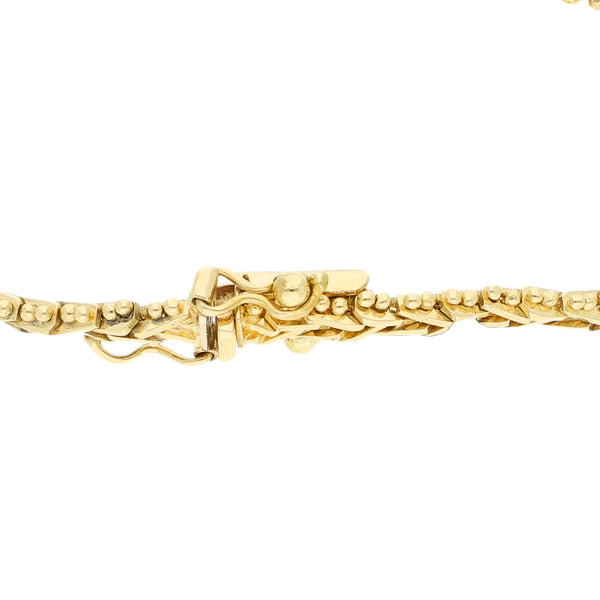 Pulsera eslabón boleado en oro amarillo 18 kilates.