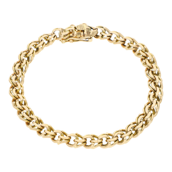 Pulsera eslabón tejido en oro amarillo 18 kilates.