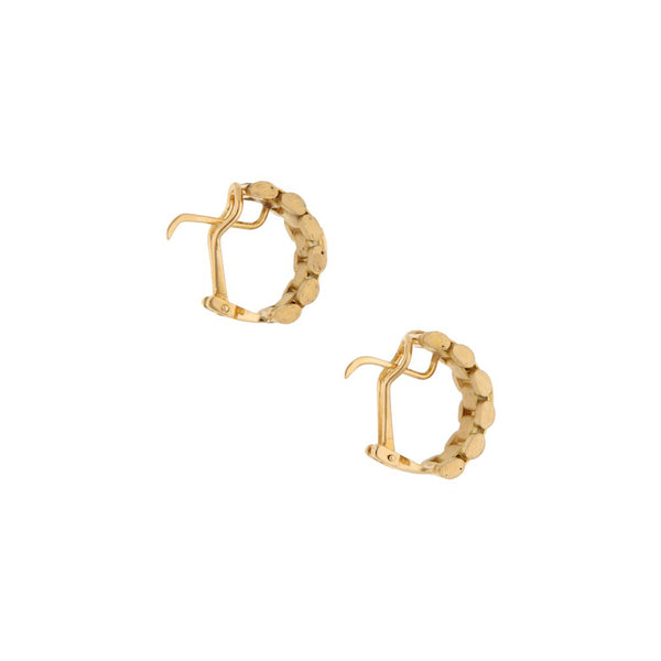 Aretes calados en oro amarillo 18 kilates.