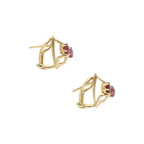 Aretes diseño especial con rubies en oro amarillo 18 kilates.