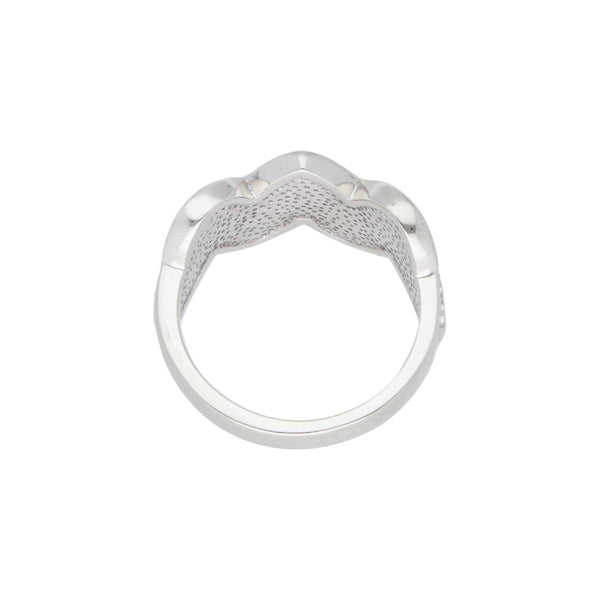 Anillo ondulado con diamantes en oro blanco 14 kilates.