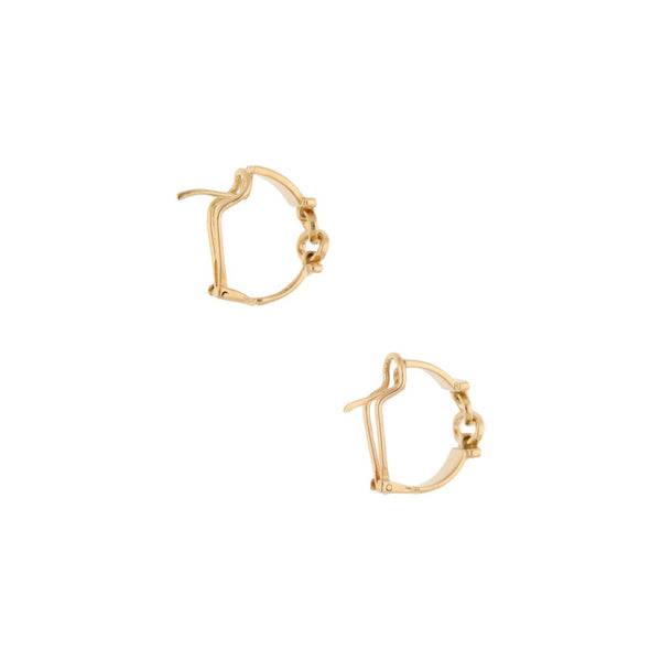 Aretes calados con diamantes en oro amarillo 14 kilates.