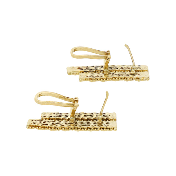 Aretes boleados en oro amarillo 18 kilates.