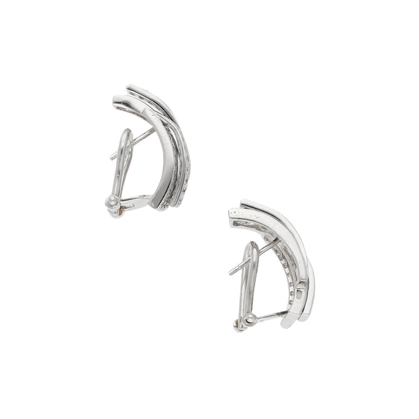 Aretes estilizados con circonias en oro blanco 14 kilates.