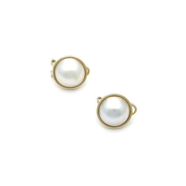 Aretes diseño especial con medias perlas en oro amarillo 14 kilates.