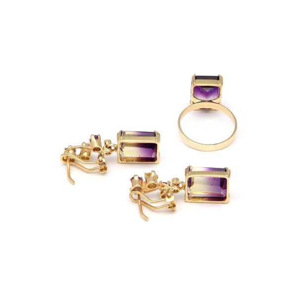 Juego de anillo y aretes diseño especial con diamantes y amatista bicolor en oro amarillo 14 kilates.