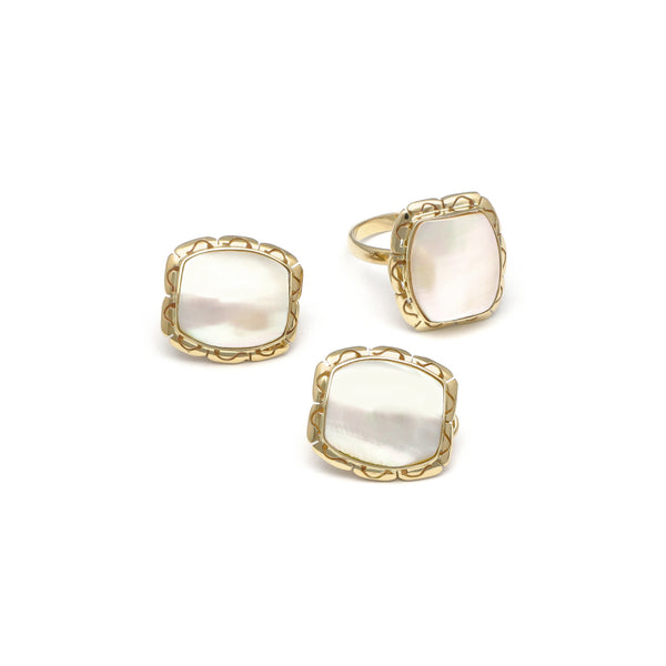 Juego de anillo y aretes calados con osmeñas en oro amarillo 14 kilates.