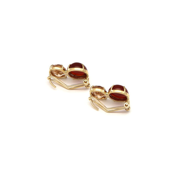 Aretes diseño especial con topacio y cornolita en oro amarillo 14 kilates.