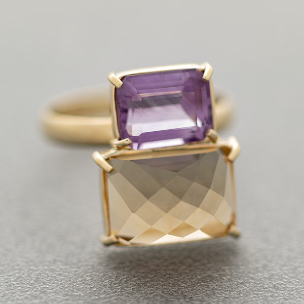Juego de anillo y aretes hechura especial con amatista y citrino en oro amarillo 14 kilates.