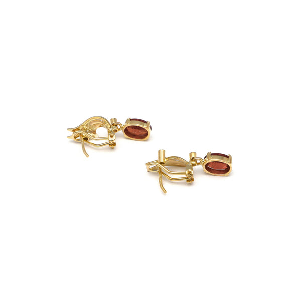 Aretes diseño especial con colgantes diamantes y titanita en oro amarillos 14 kilates.