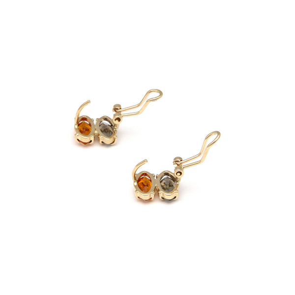 Juego de anillo y aretes diseño especial con citrino y topacio ahumado en oro amarillos 14 kilates.