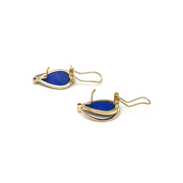 Juego de anillo y aretes calados con lapislazuli y sintéticos en oro amarillo 14 kilates.