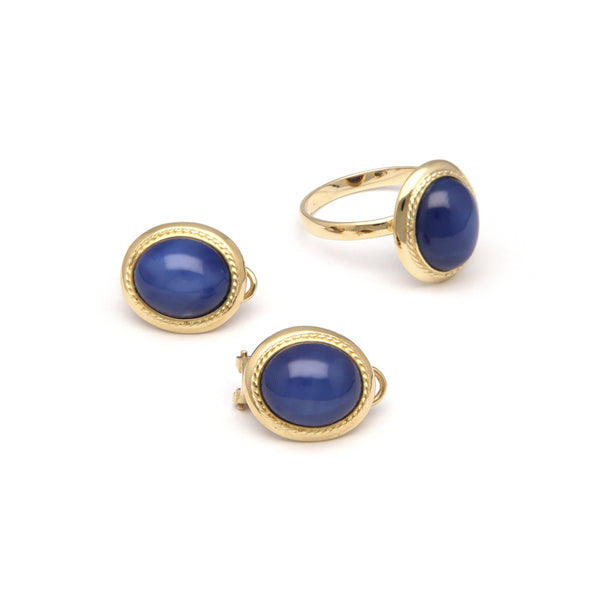 Juego de anillo y aretes diseño especial con zafiro estrella en oro amarillo 14 kilates.