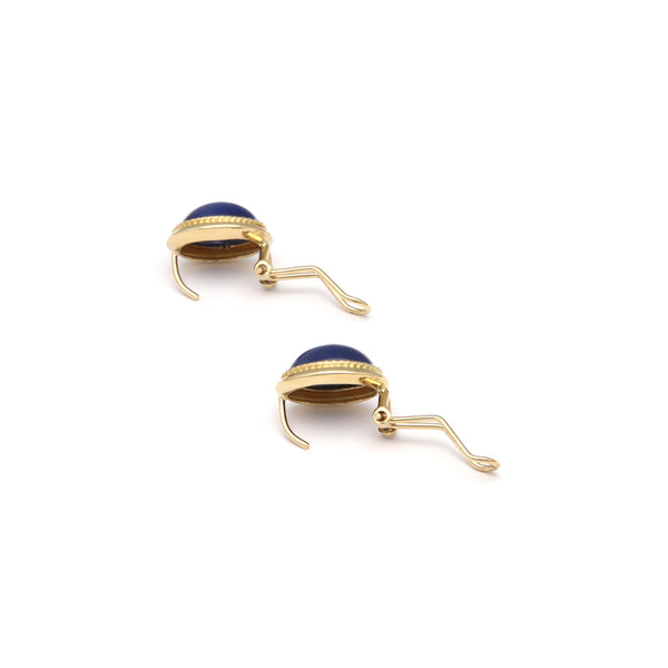 Juego de anillo y aretes diseño especial con zafiro estrella en oro amarillo 14 kilates.