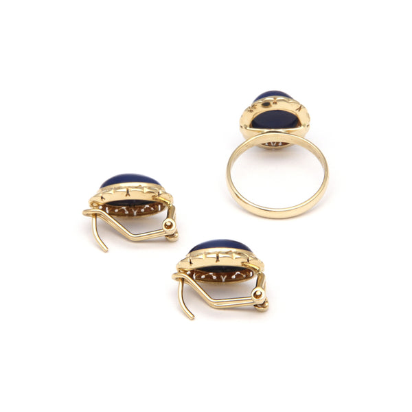 Juego de anillo y aretes calados con zafiro estrella en oro amarillo 14 kilates.