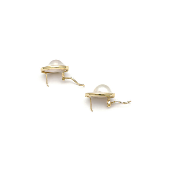 Juego de anillo y aretes diseño especial con media perla blíster en oro amarillo 14 kilates.
