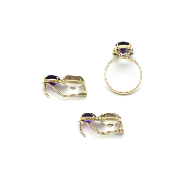 Juego de anillo y aretes diseño especial con amatista y topacio en oro amarillo 14 kilates.