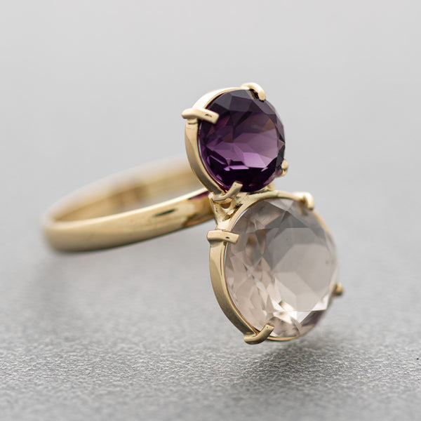 Juego de anillo y aretes diseño especial con amatista y topacio en oro amarillo 14 kilates.