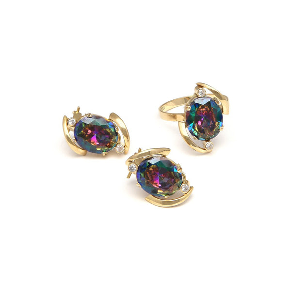 Juego de anillo y aretes calados con topacios y sintéticos en oro amarillo 14 kilates.