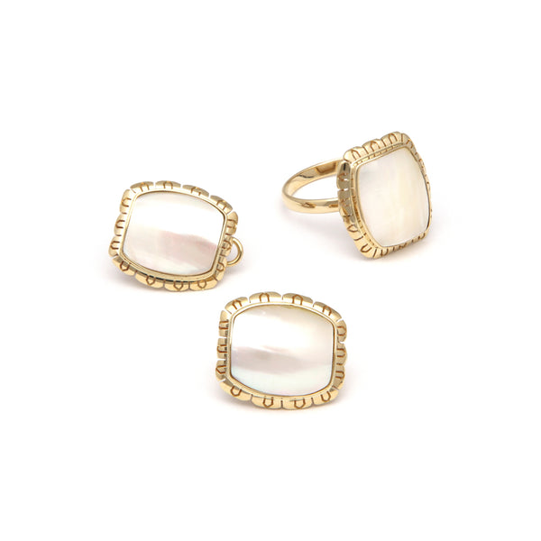 Juego de anillo y aretes diseño especial con perlas osmeñas barril en oro amarillo 14 kilates.